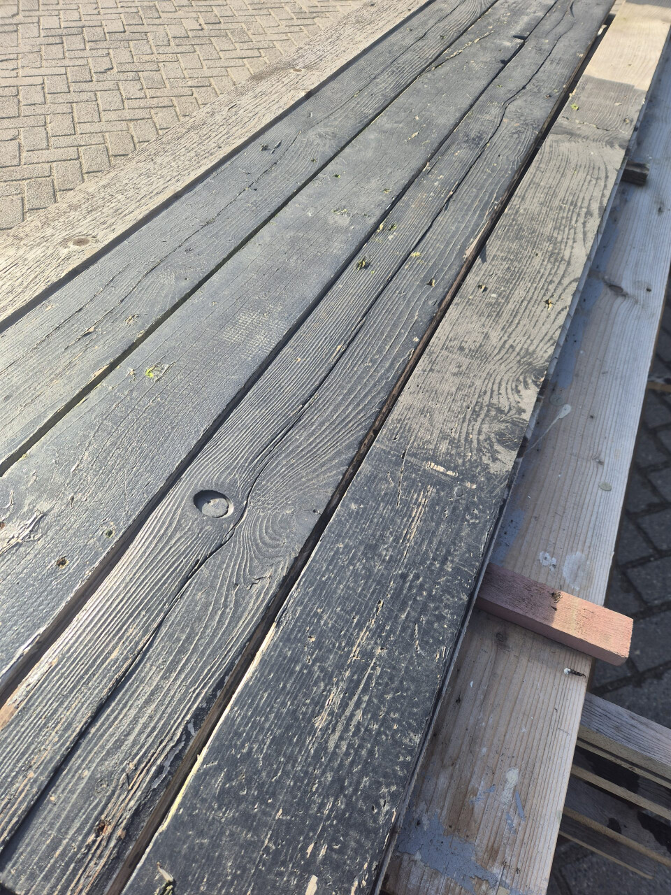 Partij planken mes en groef - zwart - 22 mm dik - Foto 1